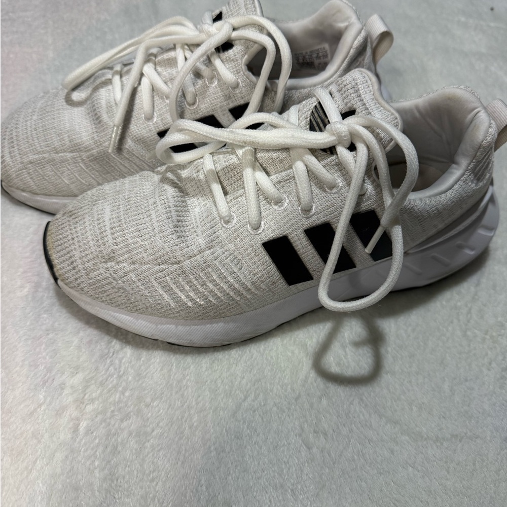 Adidas White and Black Athletic Shoes with Breathable Fabric and Cushioned Sole